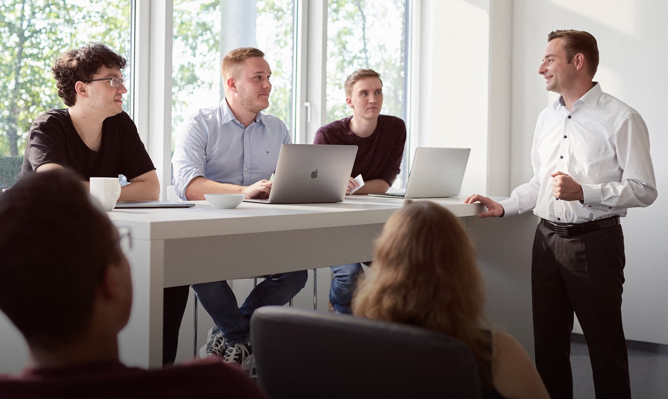 Personen in einem Meeting